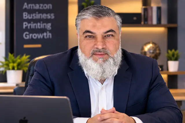 Concept image: Sheikh Rashid Elahi, Amazon business mentor, seated at a desk in a modern office